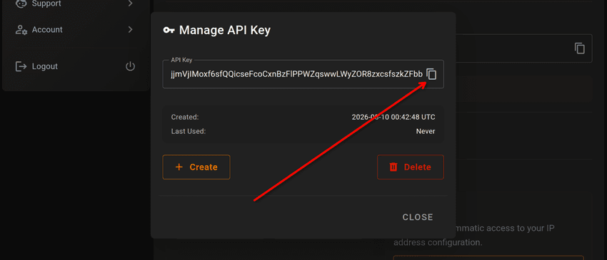 The Manage API Key dialog after creation, showing the generated key and the copy icon beside it